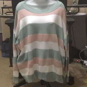 Oversized crew neck, long sleeve, striped sweater.